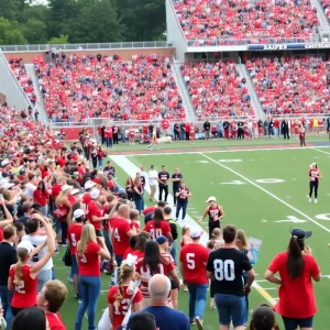 Fans cheering on a Georgia high school football team during a game.