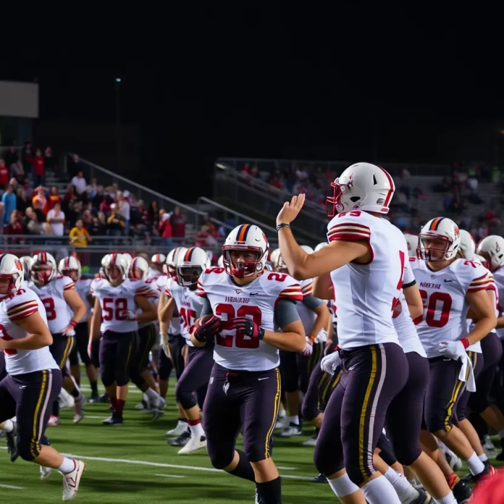Players in action during Iowa high school football games under the lights.